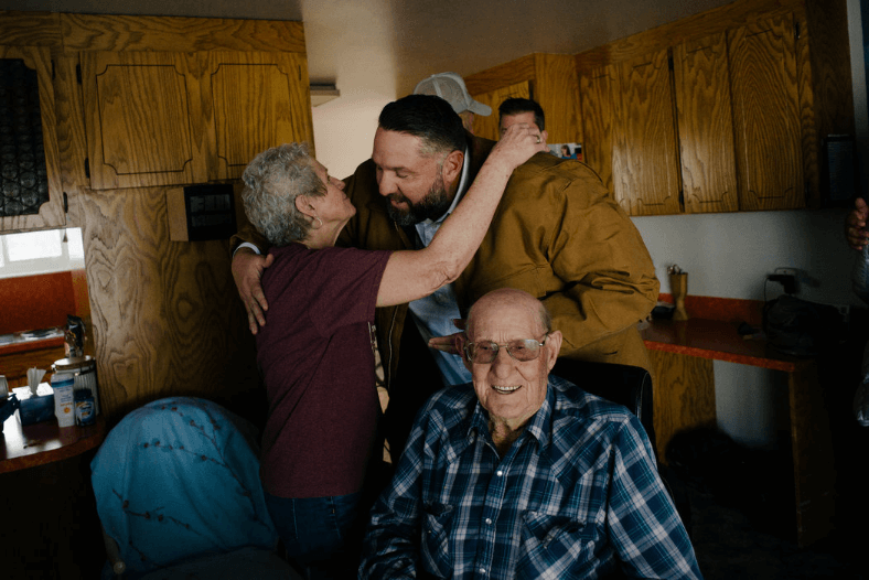 The New York Times photographed Chris Riley and his coal mining family in their kitchen in rural Utah